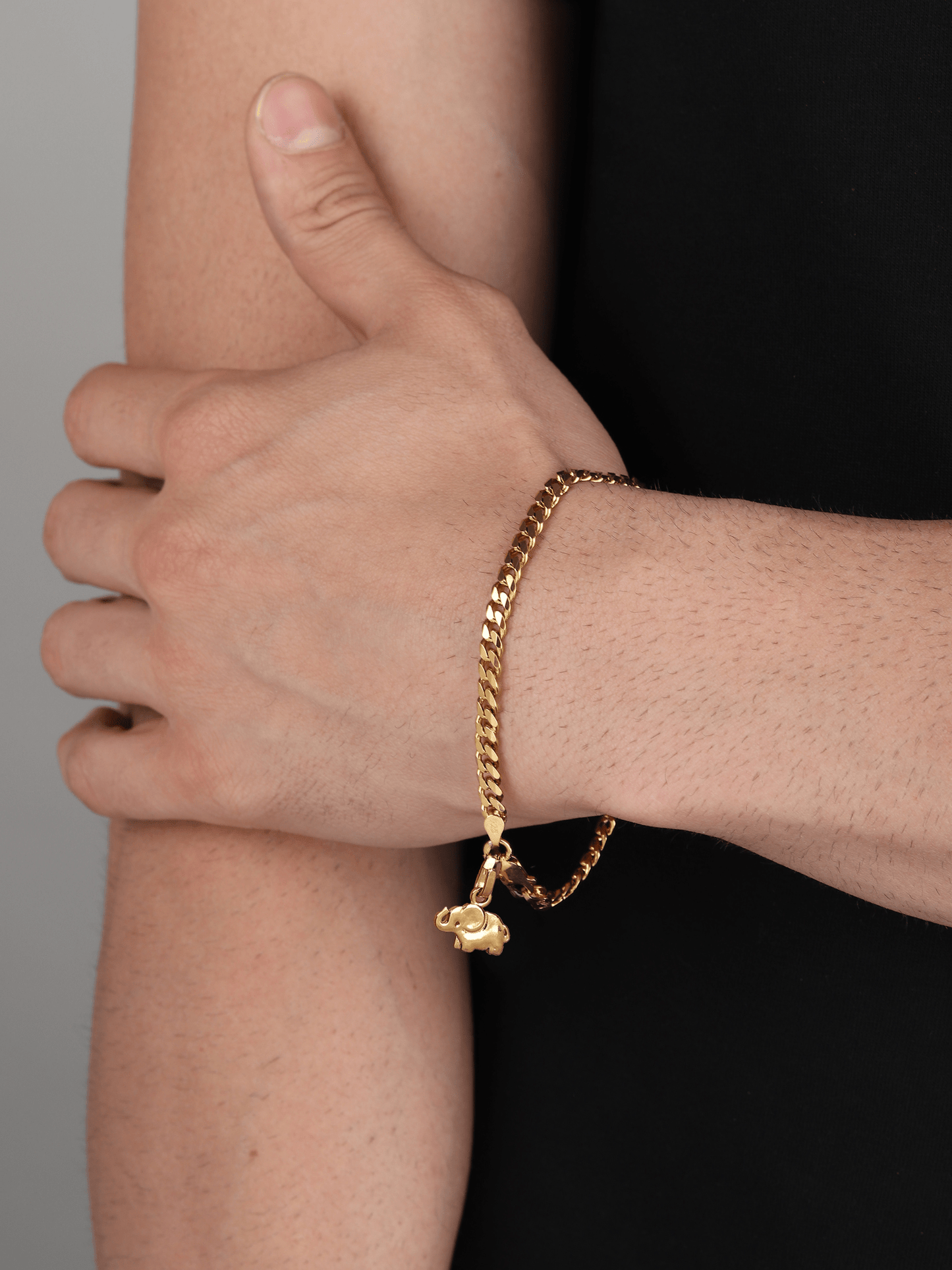 Akshat Sapphire 22KT gold plated 92.5% pure Sterling Silver Curb Designer Bracelet with fashionable Elephant for Men