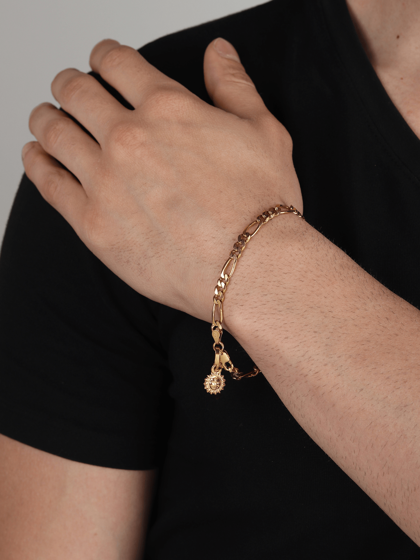 Akshat Sapphire 22KT gold plated 92.5% pure Sterling Silver Figaro Designer Bracelet with Charm Surya for Men & Boys