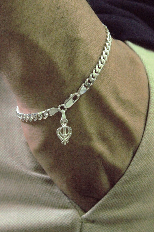 Akshat Sapphire 92.5% pure Sterling Silver Curb Designer Bracelet with spiritual Sardar Symbol for Men