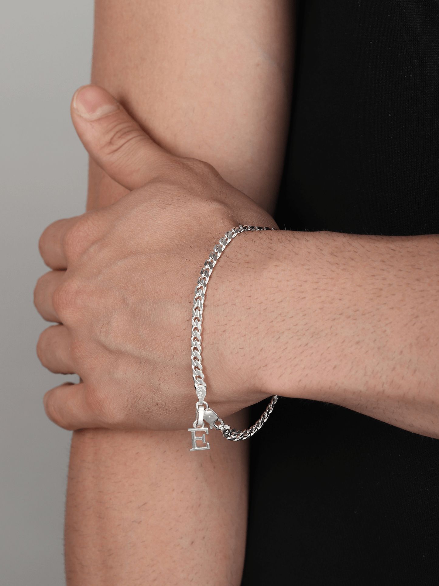 Akshat Sapphire 92.5% pure Sterling Silver Curb Designer Bracelet with E Alphabet for Men