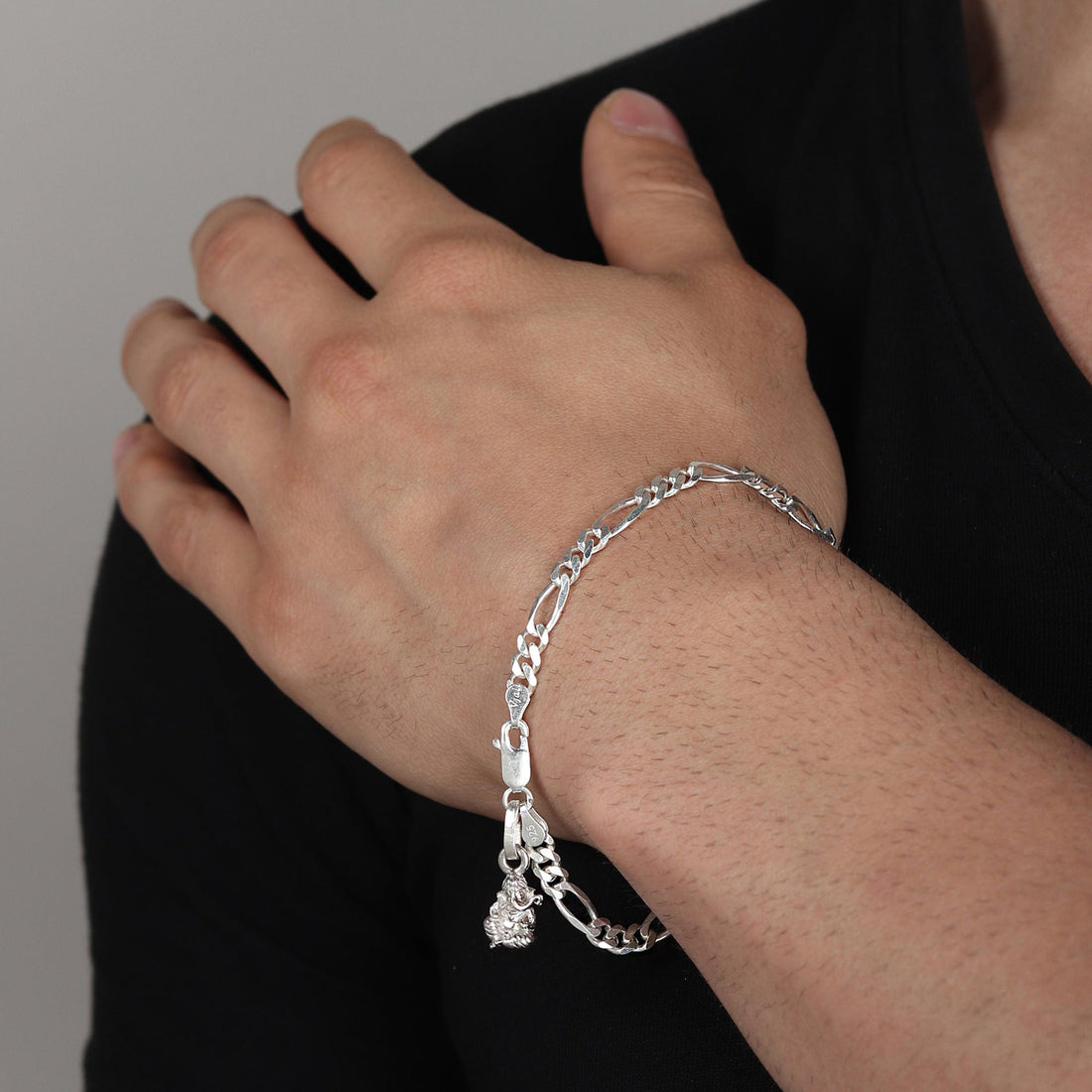 Sterling Silver figaro bracelet with ganesh charm for men by akshat sapphire 92.5 silver brmfkd7131