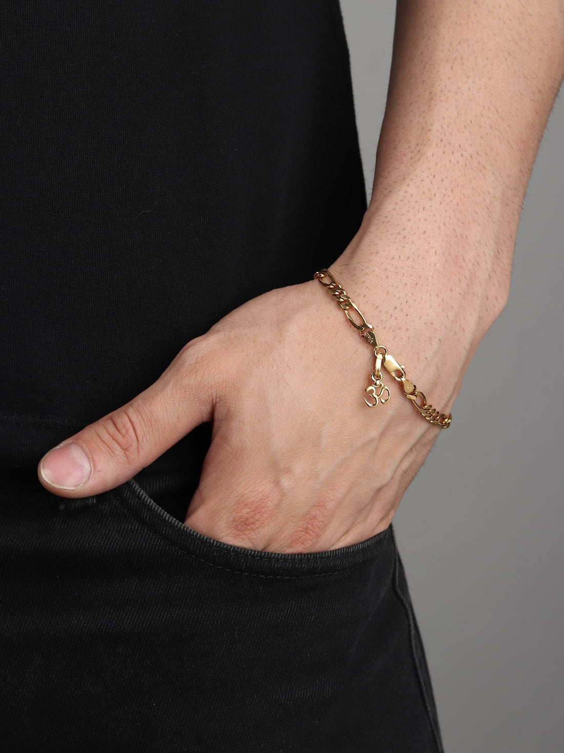22CT Gold Plated 92.5 Pure Sterling Silver Figaro Bracelet with Religious Om Charm for Men by Akshat Sapphire Gold_BRMFKD7141