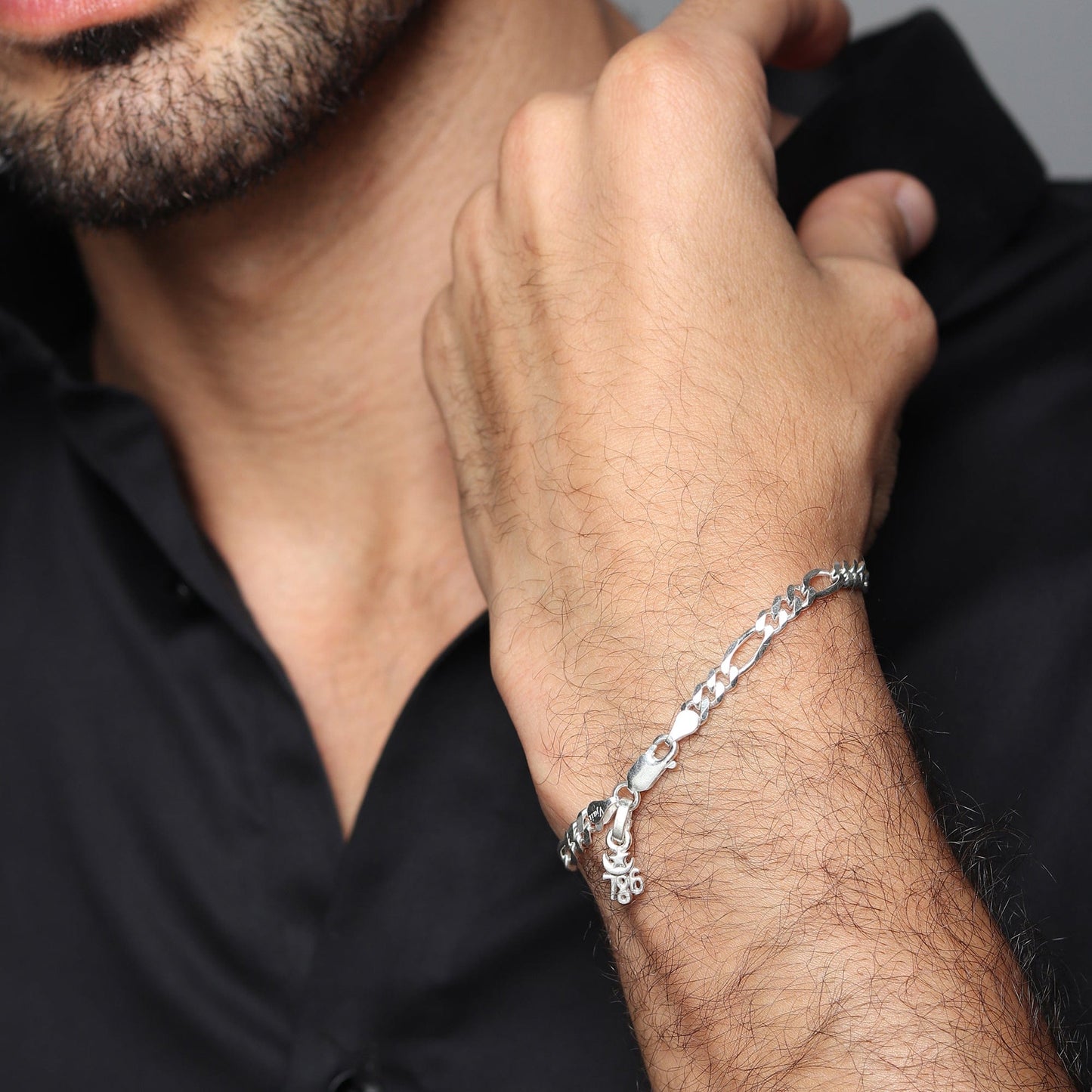 Akshat Sapphire 92.5% pure Sterling Silver Figaro Designer Bracelet with religious 786 for Men