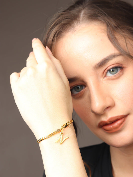 Akshat Sapphire 22KT gold plated 92.5% pure Sterling Silver Curb Designer Bracelet with N Alphabet for Girls and Women