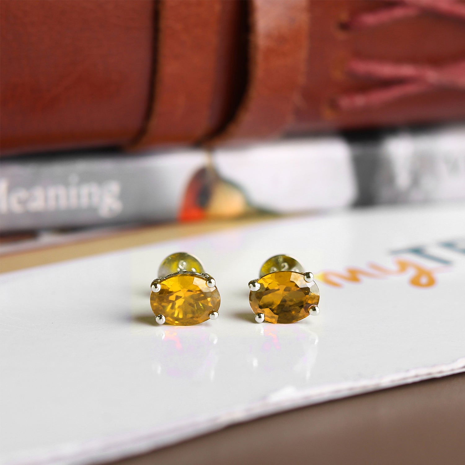 Akshat Sapphire Sterling Silver (92.5% purity) Precious Stud Earrings for Girls and Women Pure Silver Beautiful and Designer studs earring with cubic zirconia (AD) stones (8mm × 6mm)